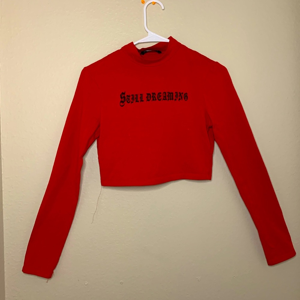 Red cropped graphic tee. “Still Dreaming “